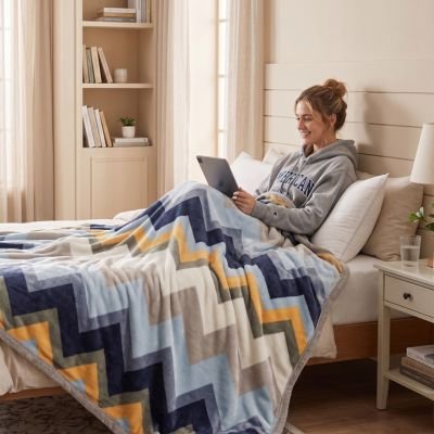 Couverture en textile moelleux offrant une sensation agréable au toucher 