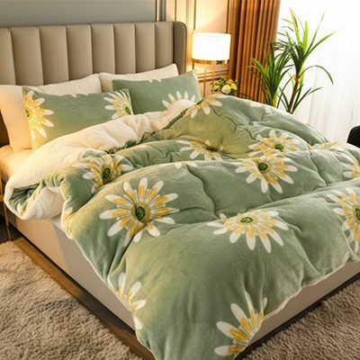 couverture motif margerite blanche et jaune sur fond vert