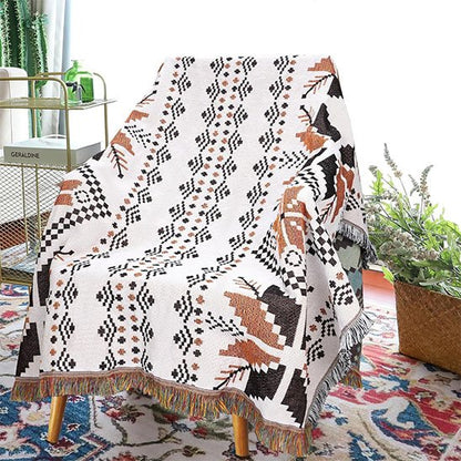 Couverture tissu jacquard en coton avec finitions frangées sur les bordures pour un style authentique et artisanal