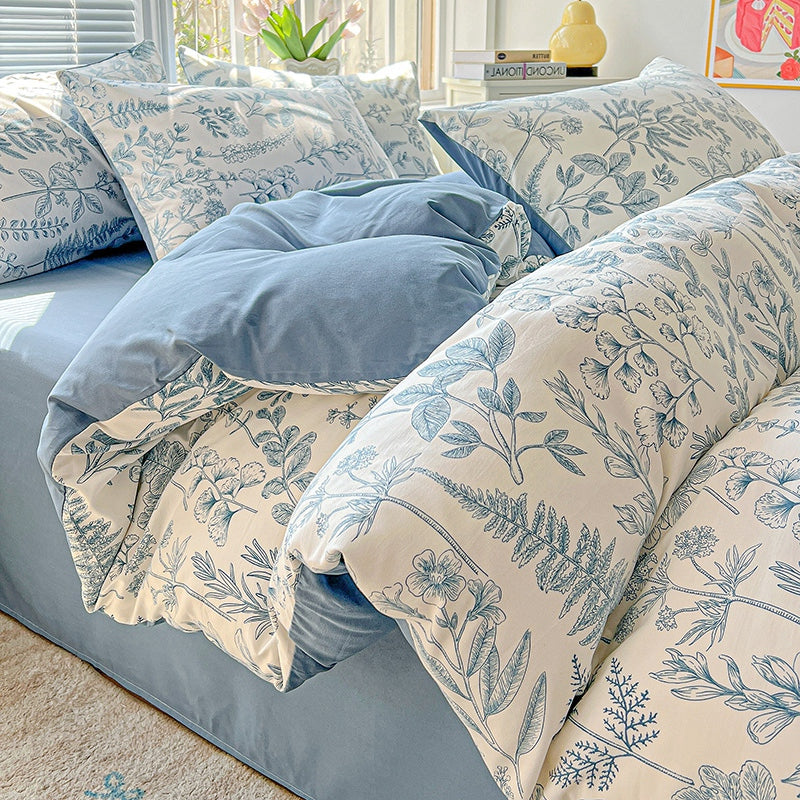 housse couette bicolores reversible dessins botaniques couleur unie bleu